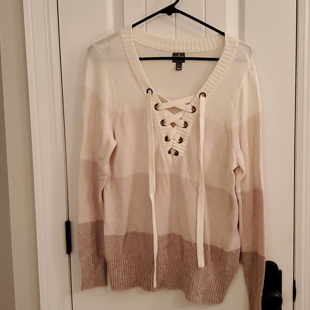 Beige, tan and light brown sweater